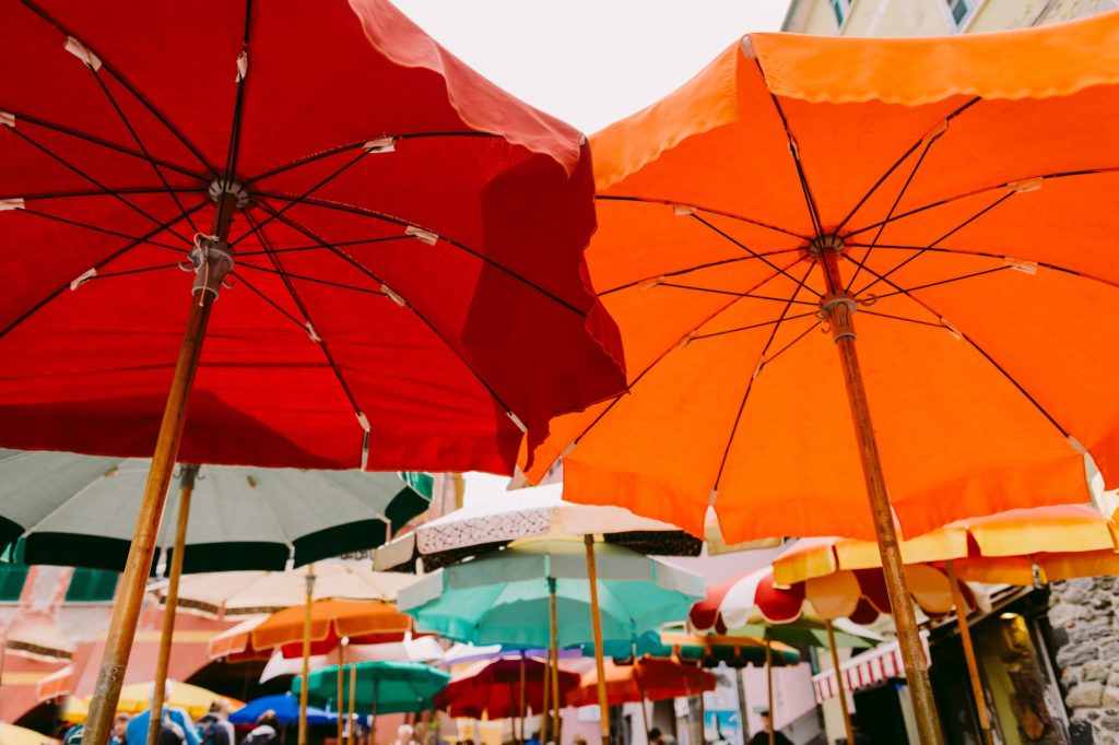 colourful umbrellas street in italy