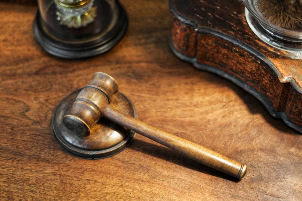Small wooden judges gavel on a desk in a high angle view